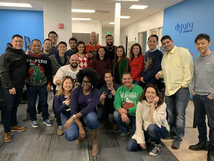 Agora team wearing ugly holiday sweaters